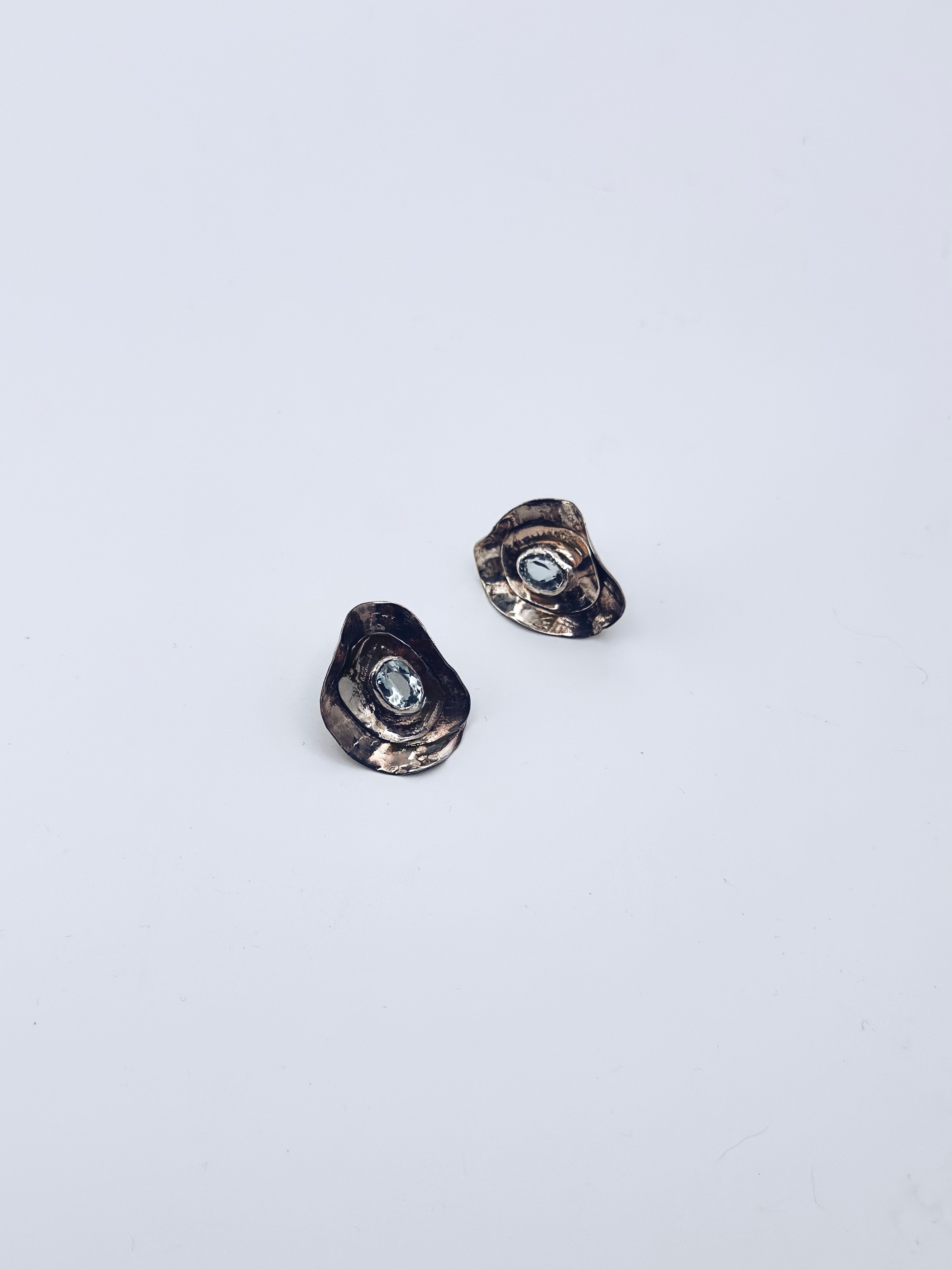 Aretes Oyster con topacio